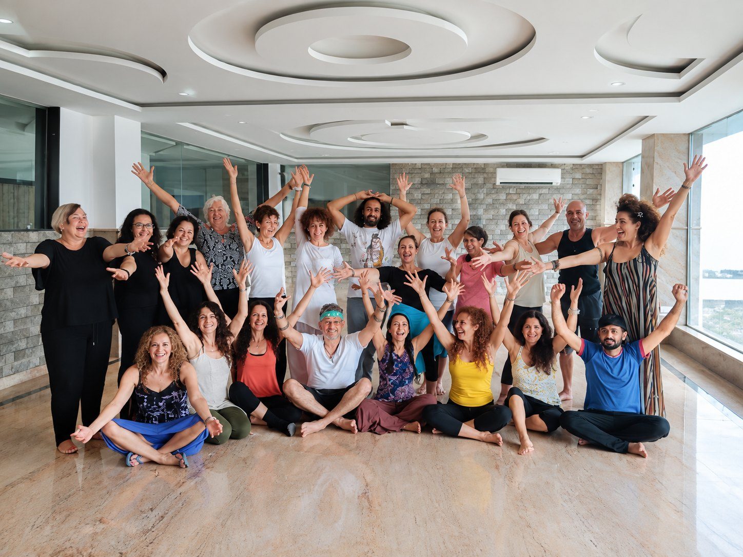 Group yoga session in an indoor wellness space