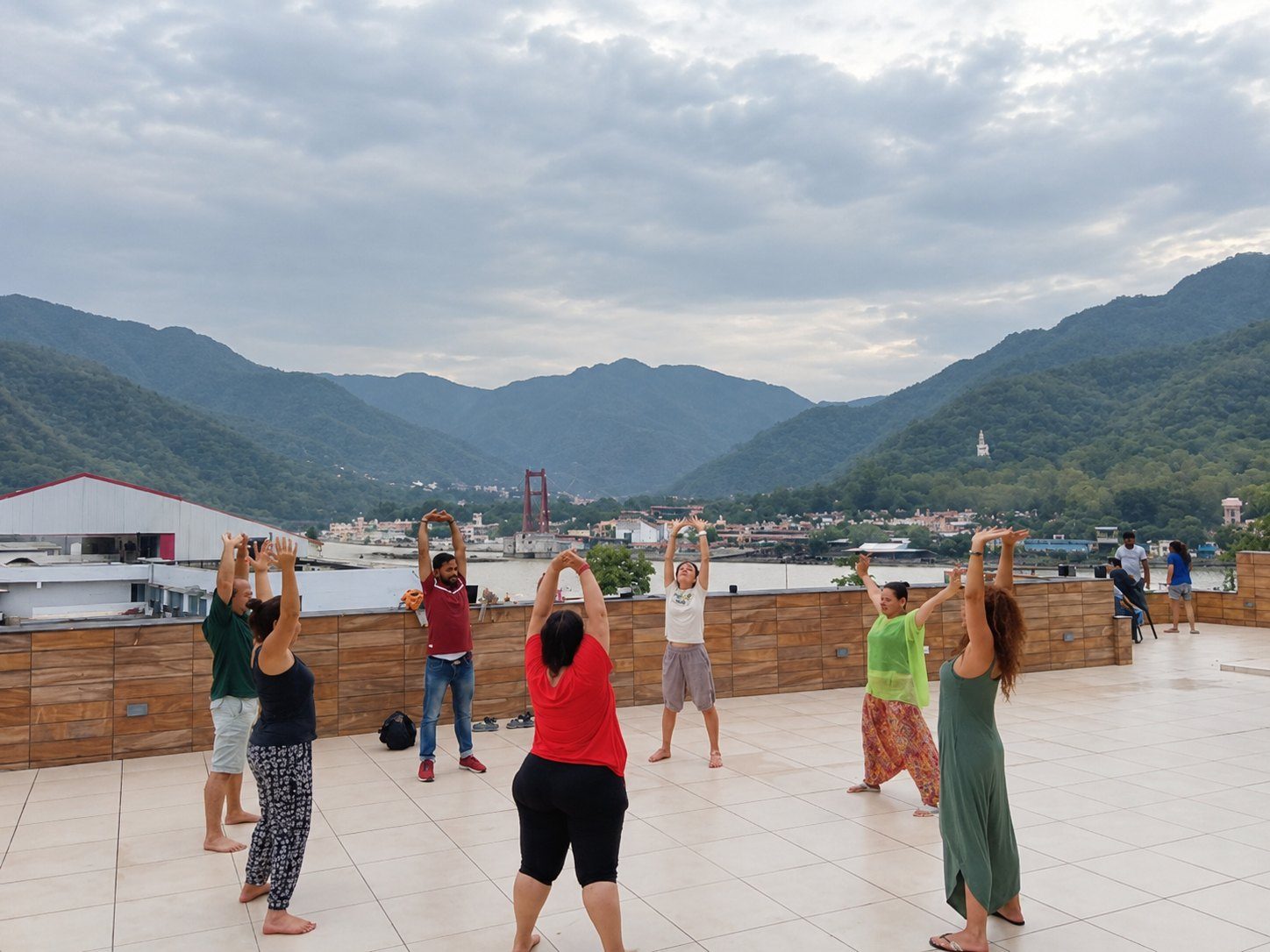 Yoga session on an open terrace with mountain views